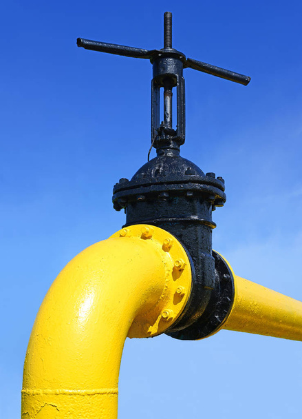 oil pump valve on the blue sky background - Photo, image