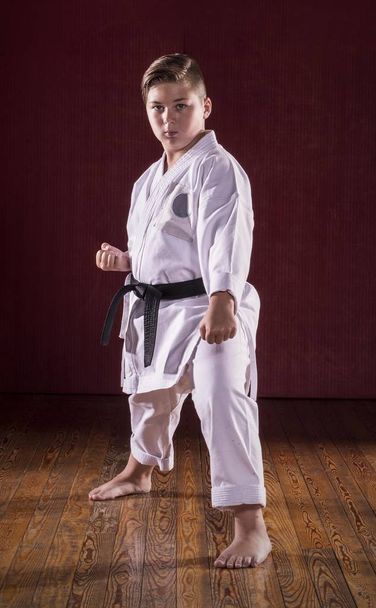 Black belt martial arts kid exhibition. - Фото, изображение