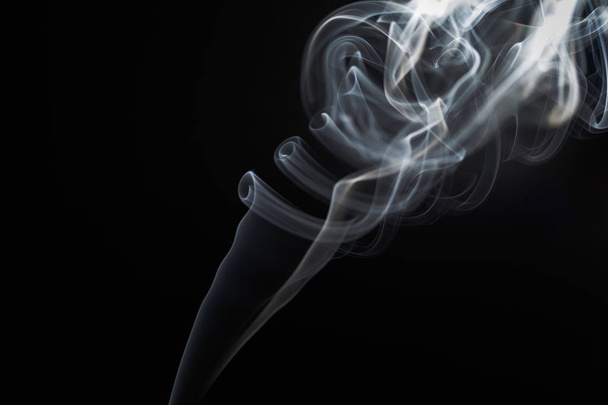pattern of smoke on a black background - Foto, afbeelding