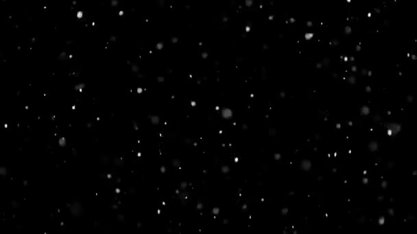 Белый снег, падающий на обледенелом черном фоне
 - Кадры, видео