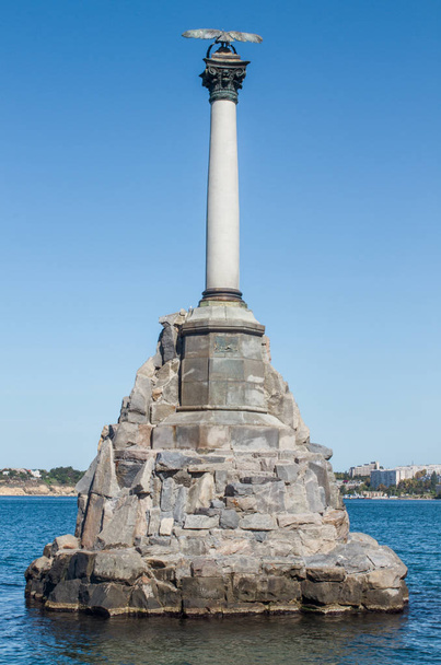 monument to the flooded ships on the beach in Sevastopol with blue sky - Foto, Imagem