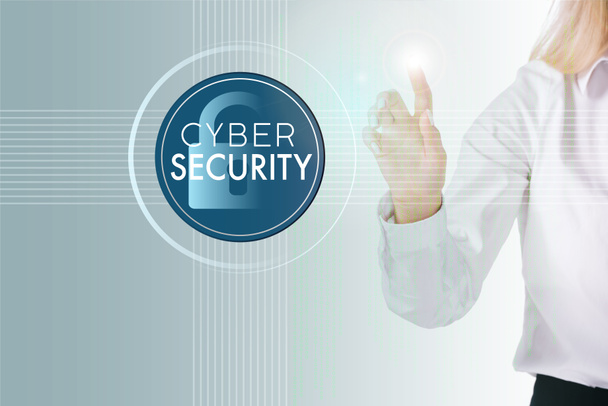 cropped shot of businesswomans hand  and cyber security sign isolated on white - Photo, Image