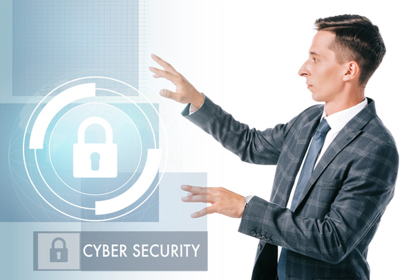 side view of businessman in suit pointing at cyber security sign isolated on white - Φωτογραφία, εικόνα