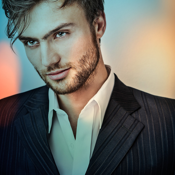 Elegant young handsome man..Multicolored digital painted image portrait of men face. - Foto, Bild