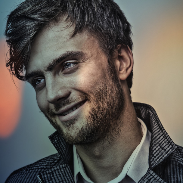 Elegant young handsome man..Multicolored digital painted image portrait of men face. - Photo, Image