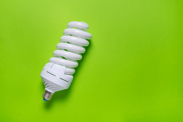 energy saving lamp on colored backgroun - Zdjęcie, obraz