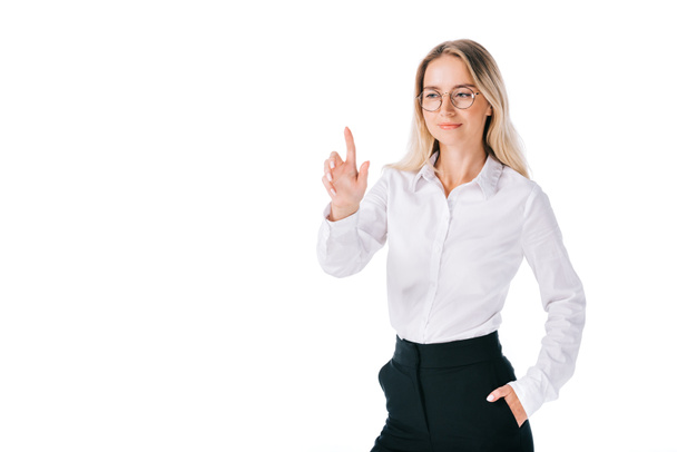 portrait of smiling businesswoman in formal wear gesturing isolated on white - Φωτογραφία, εικόνα