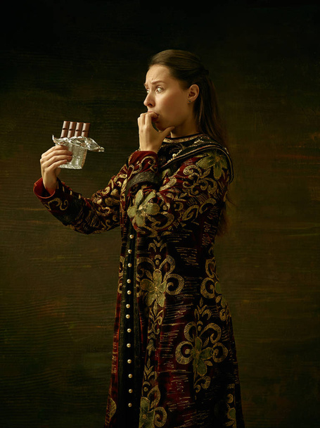 Girl standing in Russian traditional costume. - 写真・画像