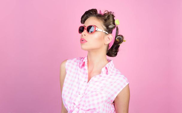 Pin up girl. beauty salon and hairdresser. vintage housewife woman make hairstyle. happy girl in summer glasses. retro woman with fashion makeup. Feeling flirty. Hip and stylish - Φωτογραφία, εικόνα