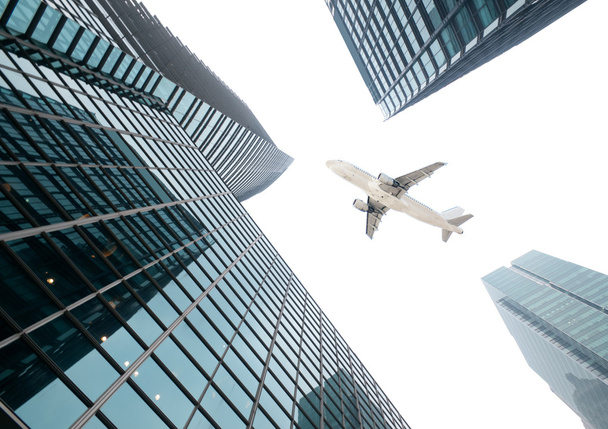 the airplane with the city - Foto, Imagen