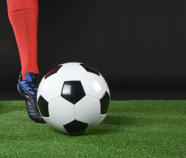 Boot kicking the soccer ball - Photo, Image