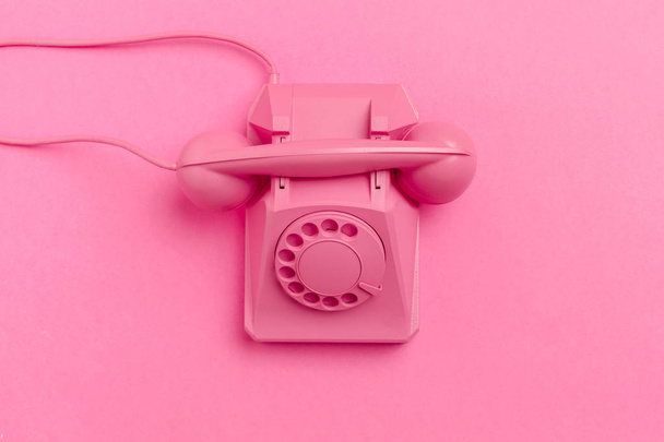 close up of vintage phone on color background - Fotó, kép