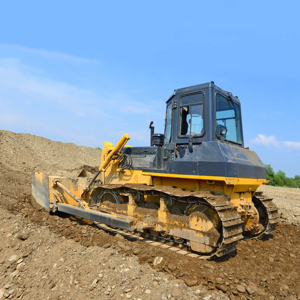bulldozer working at the quarry - 写真・画像