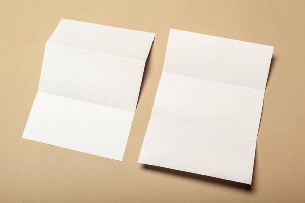 Blank paper pieces for mock up on a beige background - Valokuva, kuva