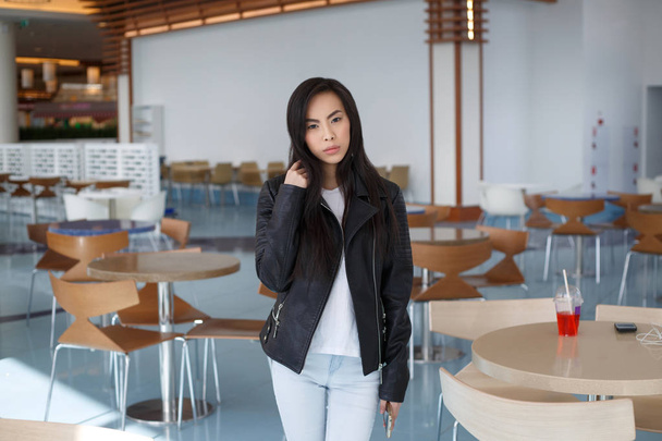 young Asian brunette girl in casual clothes posing inside - Fotoğraf, Görsel
