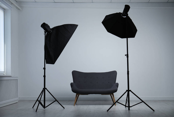 Modern photo studio with professional lighting equipment - Fotoğraf, Görsel