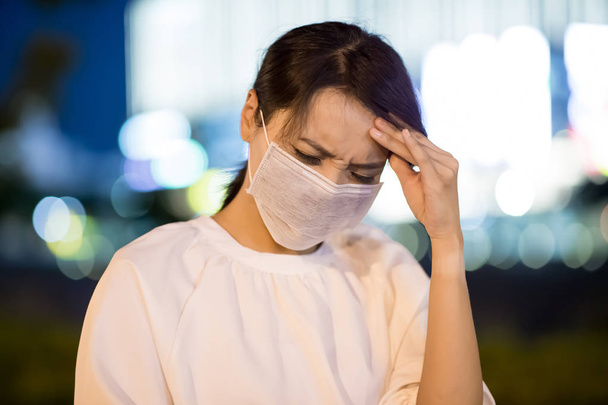 woman get sick and feel headache at night - Photo, Image