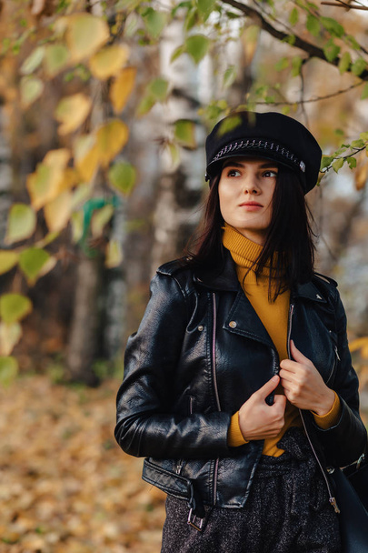 cozy stylish young girl walk at autumn colorful park alone make photos - Φωτογραφία, εικόνα