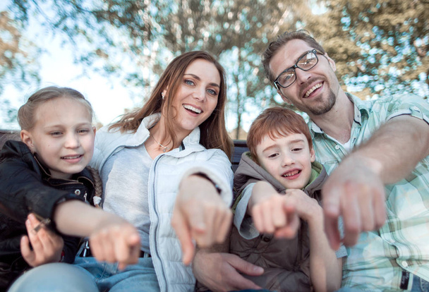 close up.smiling family pointing at you - Valokuva, kuva