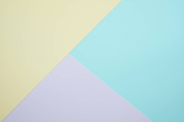 Fashionable  pastel colored paper flat lay top view, geometric background texture, pink, purple, yellow, beige, green and blue colour. - Zdjęcie, obraz