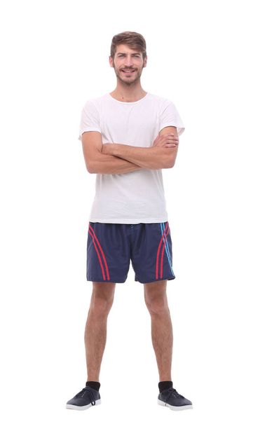 full-length .smiling young man in sportswear - Fotoğraf, Görsel