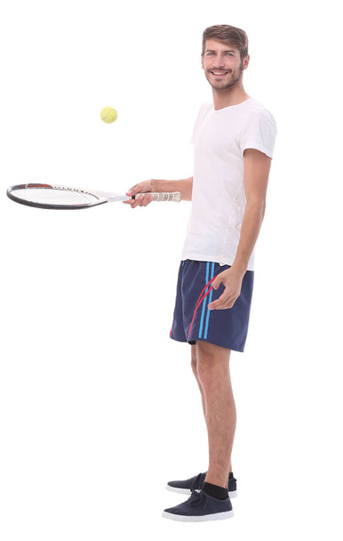 side view.smiling man with tennis racket. - Valokuva, kuva