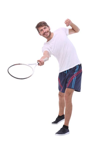 rear view. a young man with a tennis racket. - Φωτογραφία, εικόνα