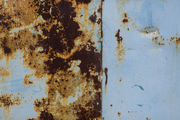 Texture of old blue rusted metal plate. Dirty and ground, can be use for design - Photo, Image