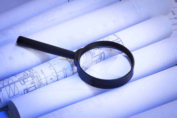 Magnifying glass and blueprint - Photo, Image