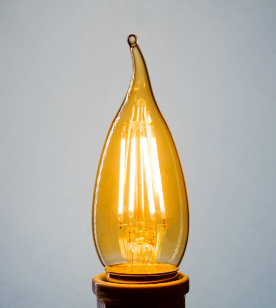 Декоративная антикварная лампочка в стиле Эдисон с подсветкой
 - Фото, изображение