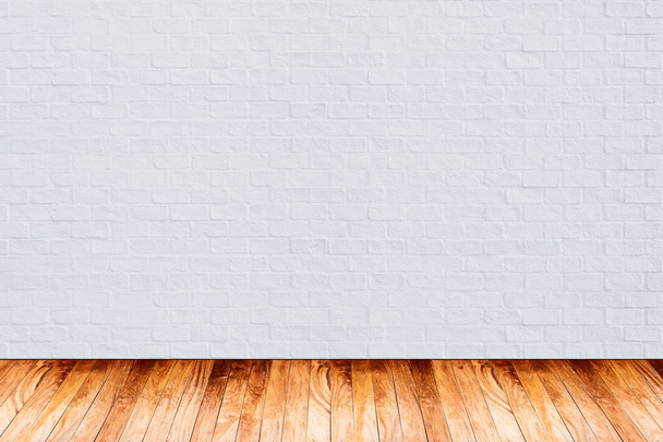 parede de tijolo branco com textura de piso de madeira para fundo
. - Foto, Imagem