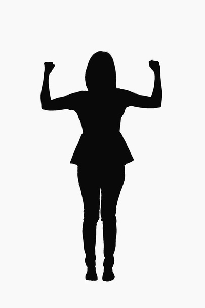 Bewegungskonzept - junge Frau in starker Pose auf weißem Hintergrund. - Foto, Bild