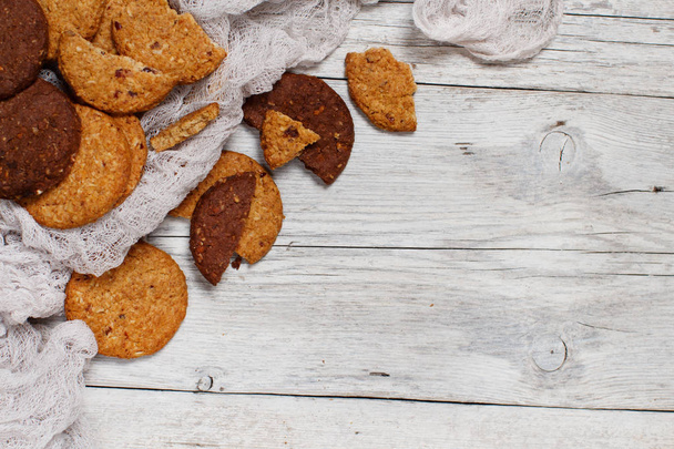 Homemade oatmeal cookies on a wooden background close up - Фото, зображення