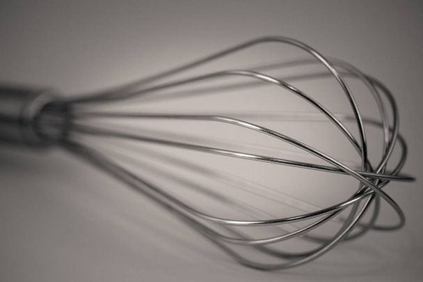 detailed monocrome macro shot of a Metal whisk, kitchen - Photo, image