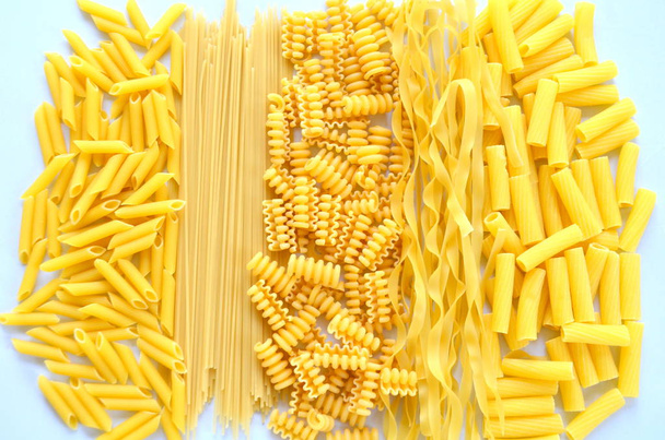 Different types of pasta, pasta are products made from flour and water - Photo, Image