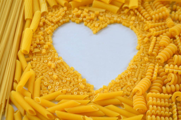 Achtergrond met verschillende pasta - Foto, afbeelding