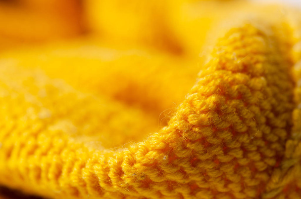 Yellow warm fabric texture material sweater - Photo, image