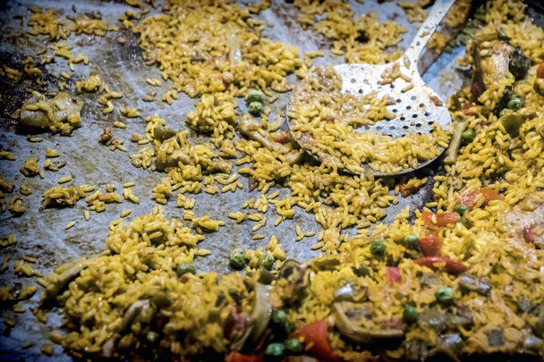 Pozůstatky španělské paelly, v wok, koncepční obrázek - Fotografie, Obrázek