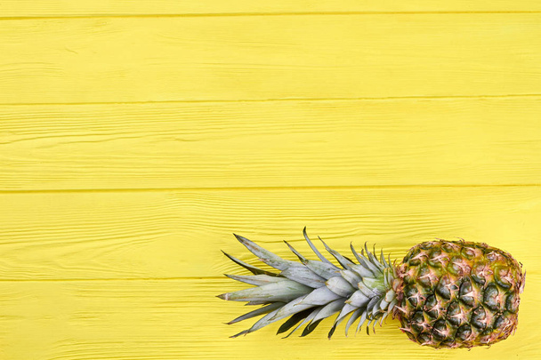 Ripe pineapple fruit on colorful background. - Photo, Image