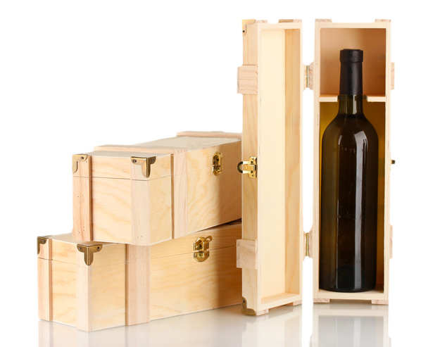 Wine bottle in wooden box, isolated on white - Фото, изображение
