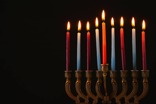 image of jewish holiday Hanukkah background with menorah (traditional candelabra) and candles - Fotoğraf, Görsel