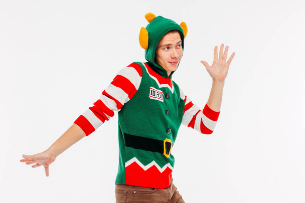 Attractive young men teenager in elf costume on white background - 写真・画像
