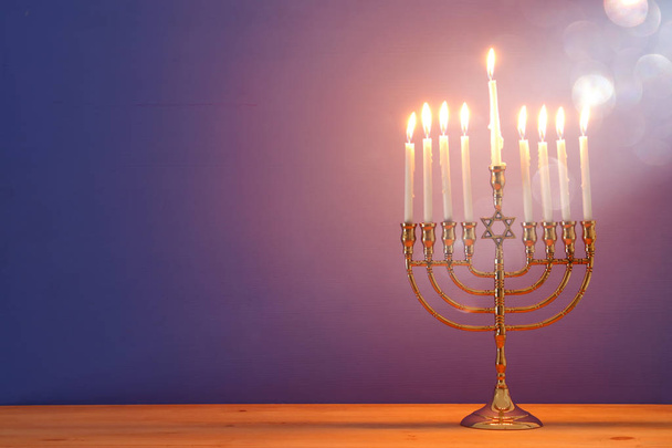 image of jewish holiday Hanukkah background with menorah (traditional candelabra) and candles - Foto, Imagen