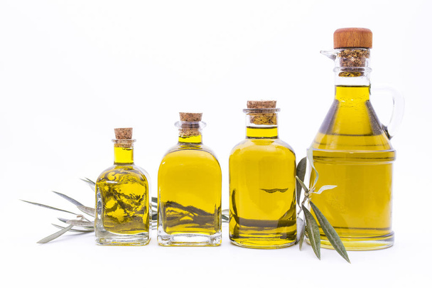 bottles of extra virgin olive oil isolated on white - Фото, изображение