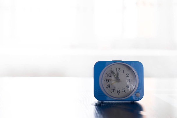 Old alarm clock as a concept of time. There is room for text. - 写真・画像