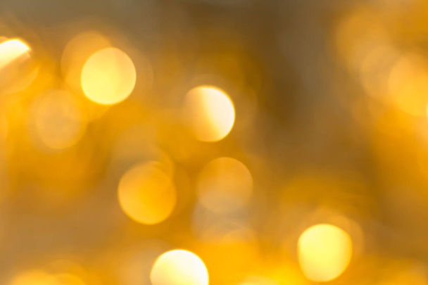 The golden bokeh abstract image for background. - Foto, imagen