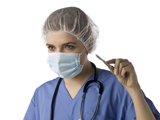 женщина-хирург с медицинским ножом
 - Фото, изображение