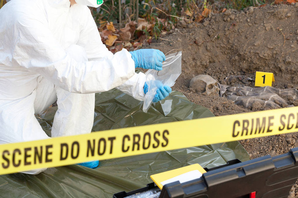 Crime scene investigation. Forensic science specialist at work. - Foto, imagen