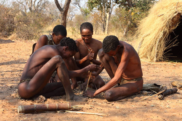 Bushmen in Namibia are making fire - Photo, Image