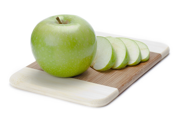 зеленое яблоко с яблочными ломтиками
 - Фото, изображение